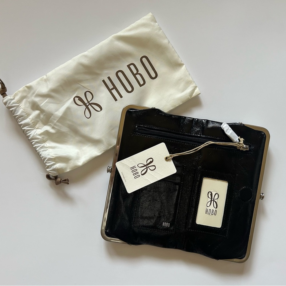 HOBO Lauren clutch-wallet black with wanderlust lining NWT